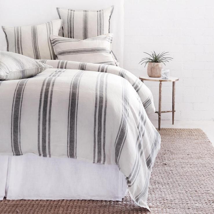 Farmhouse style bedding in flax and midnight grey stripe.